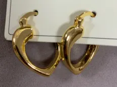 Luxury Gold Drop Hoop Earrings - 18K Gold Plated Alloy, Heart-Shaped Openwork Design, Lightweight Face-Slimming Statement Earrings for Women