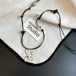 Black Braided Cord Flower Necklace - Polished Alloy Five-Petal Pendant, Adjustable Hand-Knotted Choker, Minimalist Boho Jewelry for Women