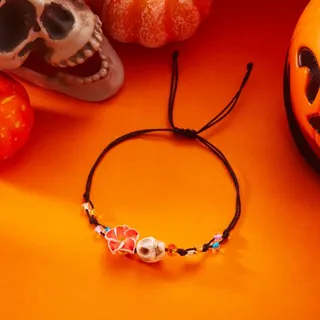 Halloween Pumpkin Beaded Bracelet, Adjustable Woven Cord with Resin Jack-O-Lantern Charm, Black & Orange Party Accessory for Women