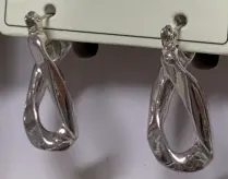 Luxury Geometric Teardrop Earrings - Alloy Silver Plated with Micro-Paved Zircon, Hollow Twisted Ring Design, Versatile Commute Jewelry